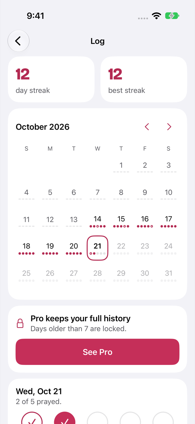Log screen with a 12 day streak and a monthly calendar